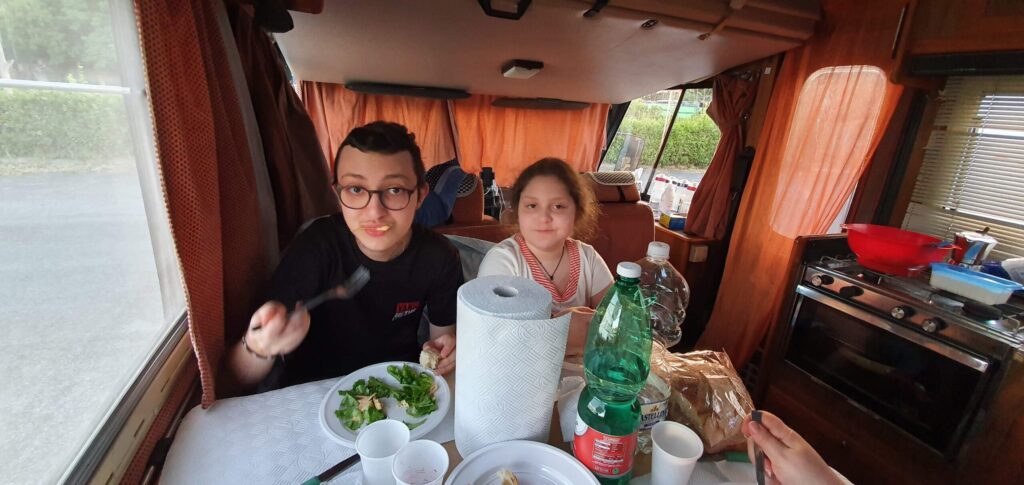 Eugenio and Francesca having lunch in the Albino camper