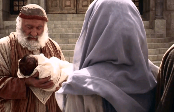 Giuseppe e Maria portano Gesù a Gerusalemme